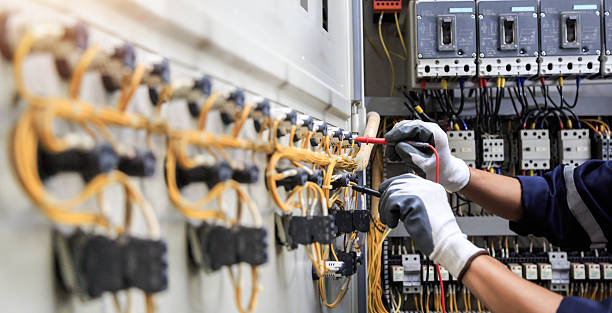 Professional Electrician technician working in Gang Mills, NY